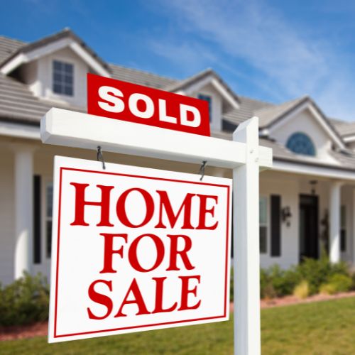 Sell My Home - Free Home Valuation button - Image is a stock image of a For Sale Sign with a Sold Flag on top - Adrian Irvin Lic. Real Estate Salesperson at Warren Real Estate