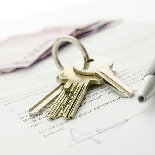 Want to Buy - Free Home Criteria Search button - Image is a stock image of keys to a home on top of a contract - Adrian Irvin Lic. Real Estate Salesperson at Warren Real Estate